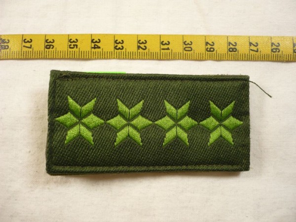 Allgemein: Dienstgradabzeichen für Einsatzanzug Polizei, 4 Sterne grün
