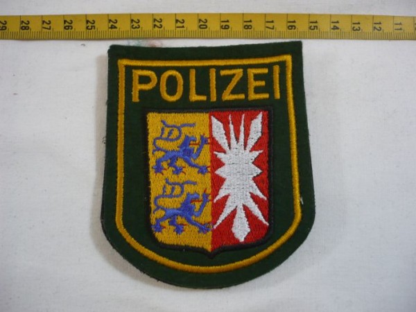 Schleswig-Holstein: Armabzeichen, Polizei Schleswig-Holstein, grün, maschinengestickt, mit Klett