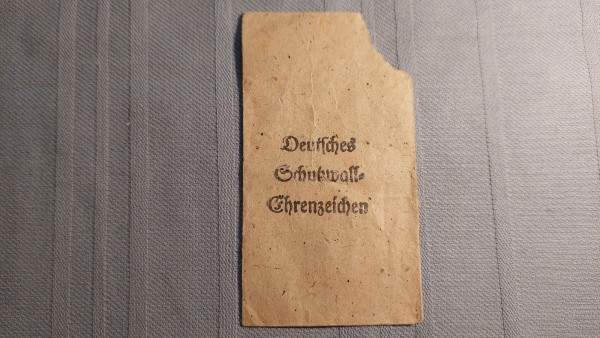 Verleihungstüte für Deutsches Schutzwall Ehrenzeichen