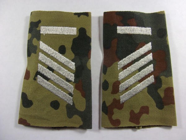 Rangschlaufen Stabsgefreiter UA weiß auf Flecktarn aus #Versuchsstoff#