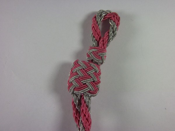 Allgemein: Mützenkordel Feuerwehr 2 silber 2 hellrosa