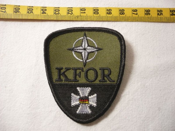 Verbandsabzeichen KFOR, schwarz auf oliv, 7cm