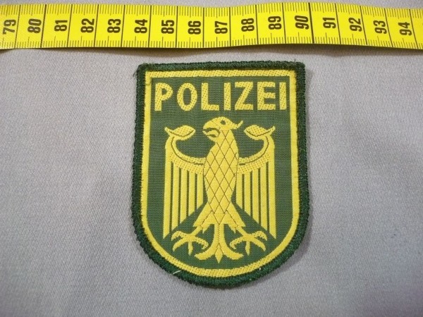 BUND: Armabzeichen, Bundespolizei: Bundesadler mit der Aufschrift "POLIZEI"
