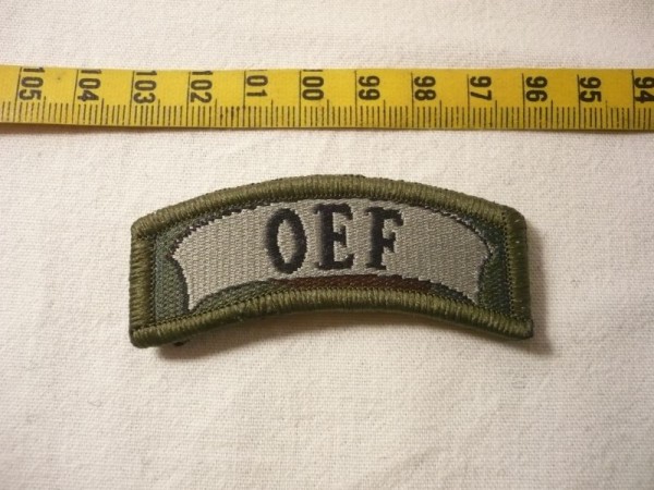 Verbandsabzeichen OEF Schriftbogen schwarz/oliv