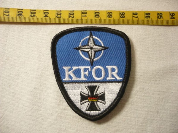 Verbandsabzeichen KFOR, weiß/blau. 7cm