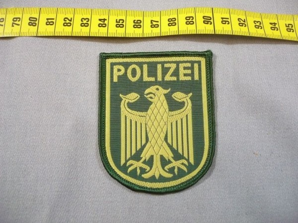 BUND: Armabzeichen, Bundespolizei: Bundesadler mit der Aufschrift "POLIZEI"