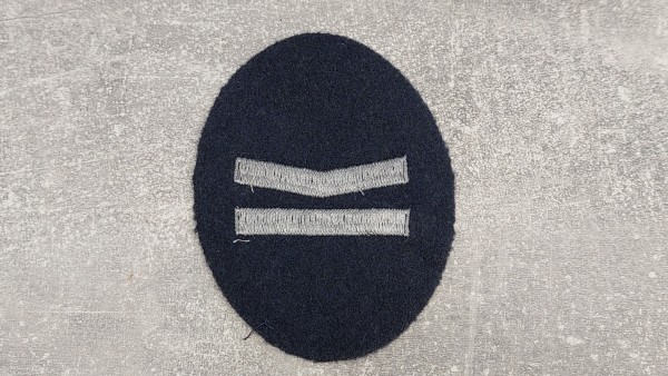 Dienstgradabzeichen Polizei Berlin auf grau oval - Polizeimeister