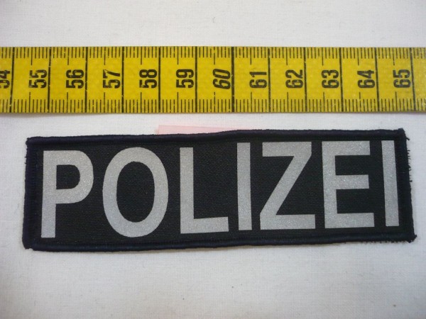 Allgemein: Schriftzug Polizei, Leuchtfarben auf schwarz
