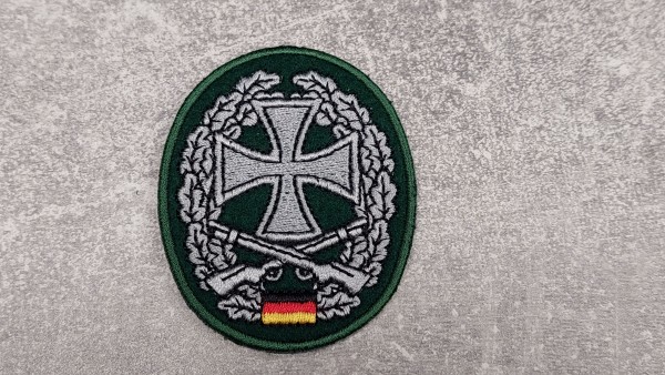 Bundeswehr Barettabzeichen Heimatschutz maschinengestickt auf grün