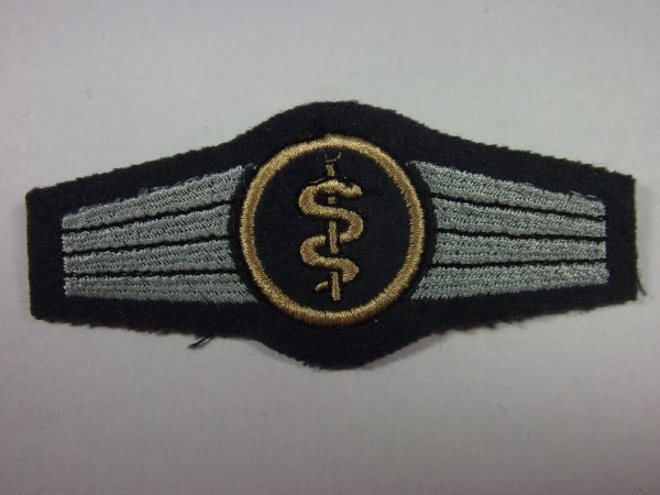 Tätigkeitsabzeichen, Sanitätspersonal, bronze auf dunkelgrau