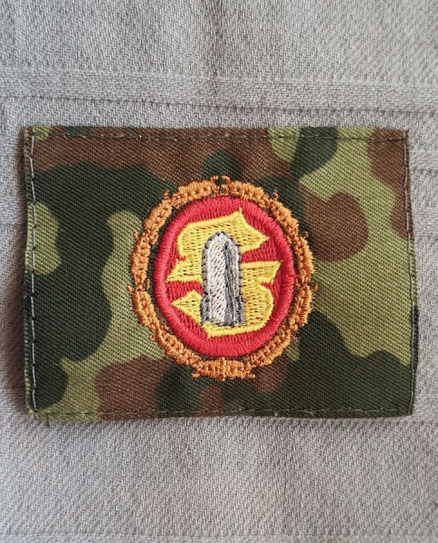 Munitionsfachpersonal, bronze bunt auf flecktarn maschinengestickt