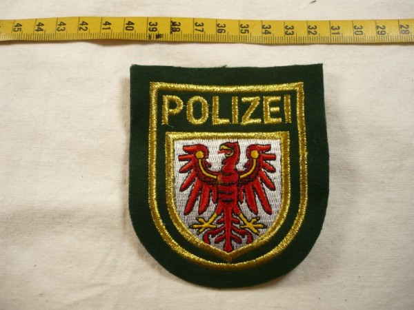 Brandenburg: Armabzeichen, Polizei Brandenburg, grün, Lurex gold maschinengestickt