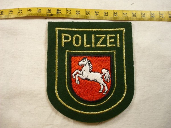 Niedersachsen: Armabzeichen, Polizei Niedersachsen, grün, Lurex gold maschinengestickt