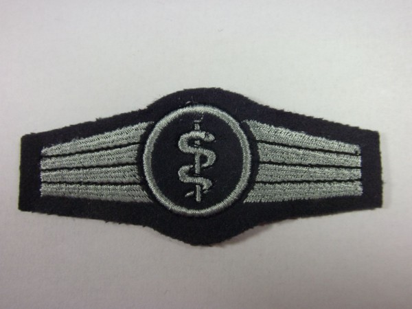 Tätigkeitsabzeichen, Sanitätspersonal, silber auf dunkelgrau