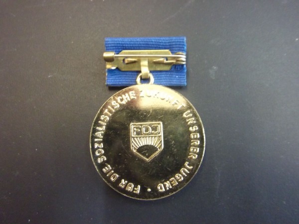 Artur Becker Medaille, in gold