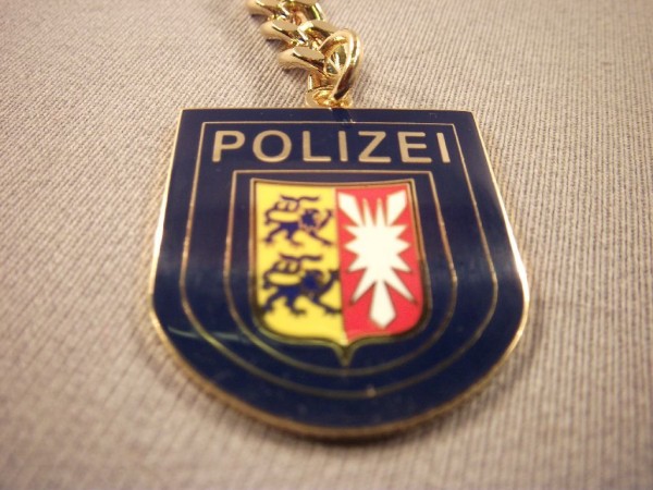 Schleswig-Holstein: Schlüsselanhänger, Polizei Schleswig-Holstein, Metall, mit Kette, wie das Armabzeichen, blau