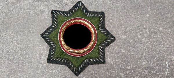 Deutsches Kreuz in Gold Stoffausführung auf feldgrau