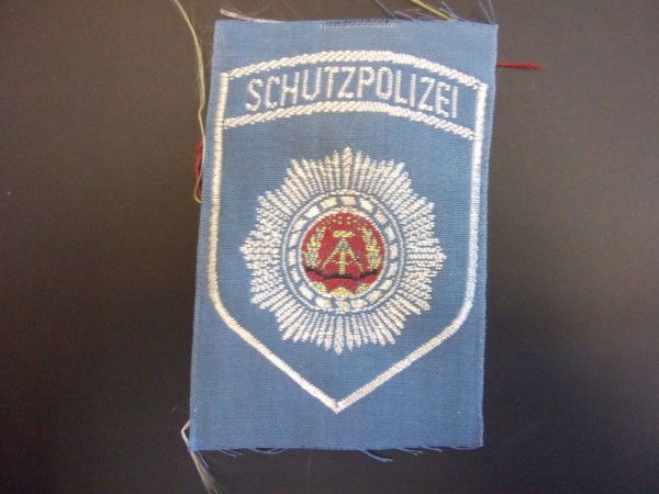 Armabzeichen, Trapo - (Transportpolizei) blau mit Aufschrift Schutzpolizei