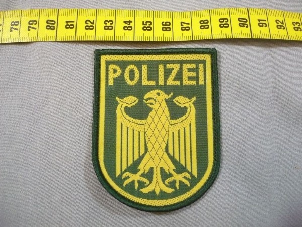 BUND: Armabzeichen, Bundespolizei: Bundesadler mit der Aufschrift "POLIZEI"